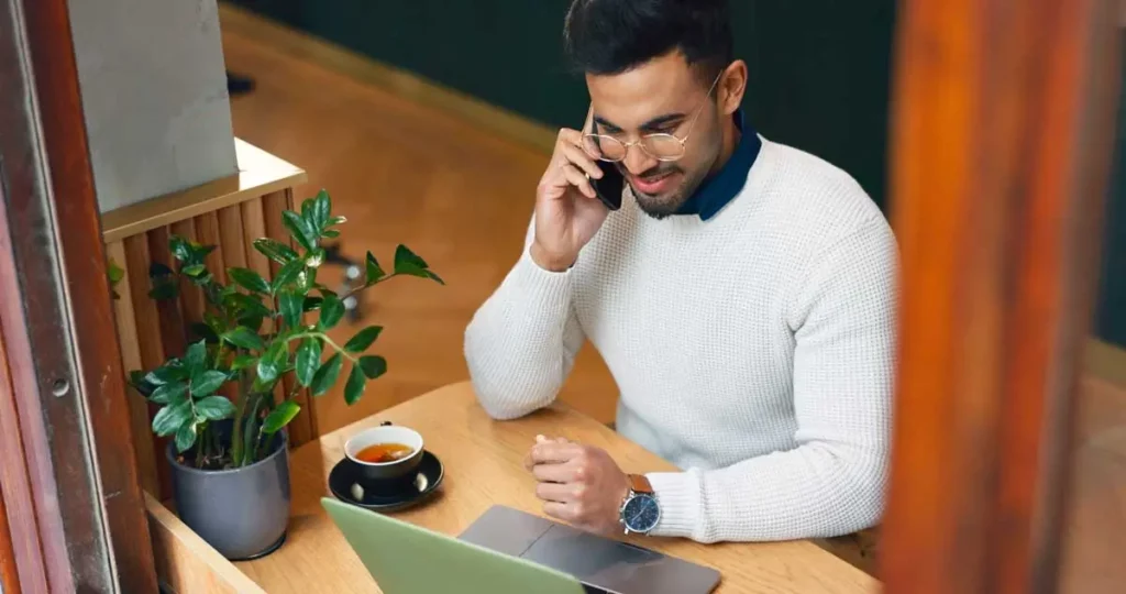 man phone call and computer at cafe for remote wo 2023 11 27 05 09 13 utc 1024x540